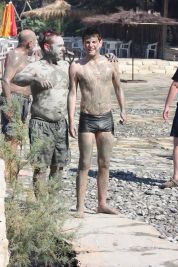 Father and son at mud bath (click for 205Kb version)